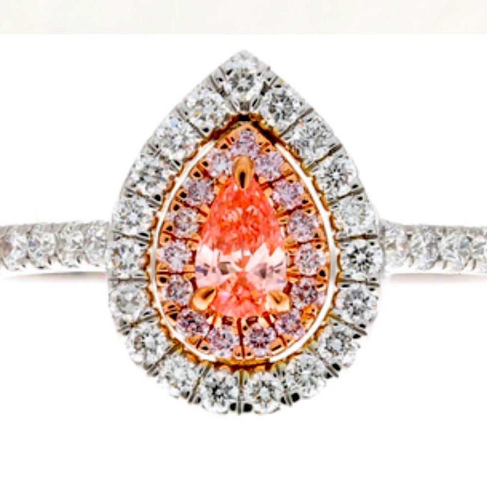 Vivid fancy pink colored diamond IGI certified set 14 carat white gold